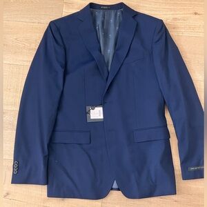 John Varvaratos Blue Suit Brand New with tags. Size 40R. Blazer and pants set.